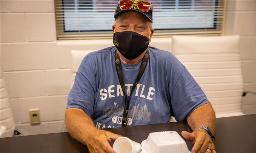 A man is wearing a mask